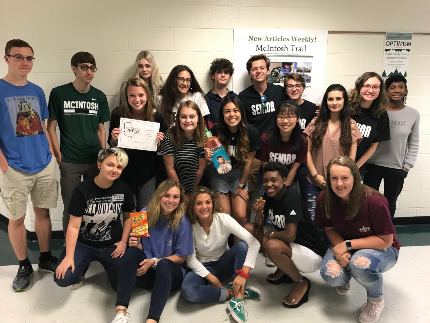 The McIntosh Trail Staff celebrates earning