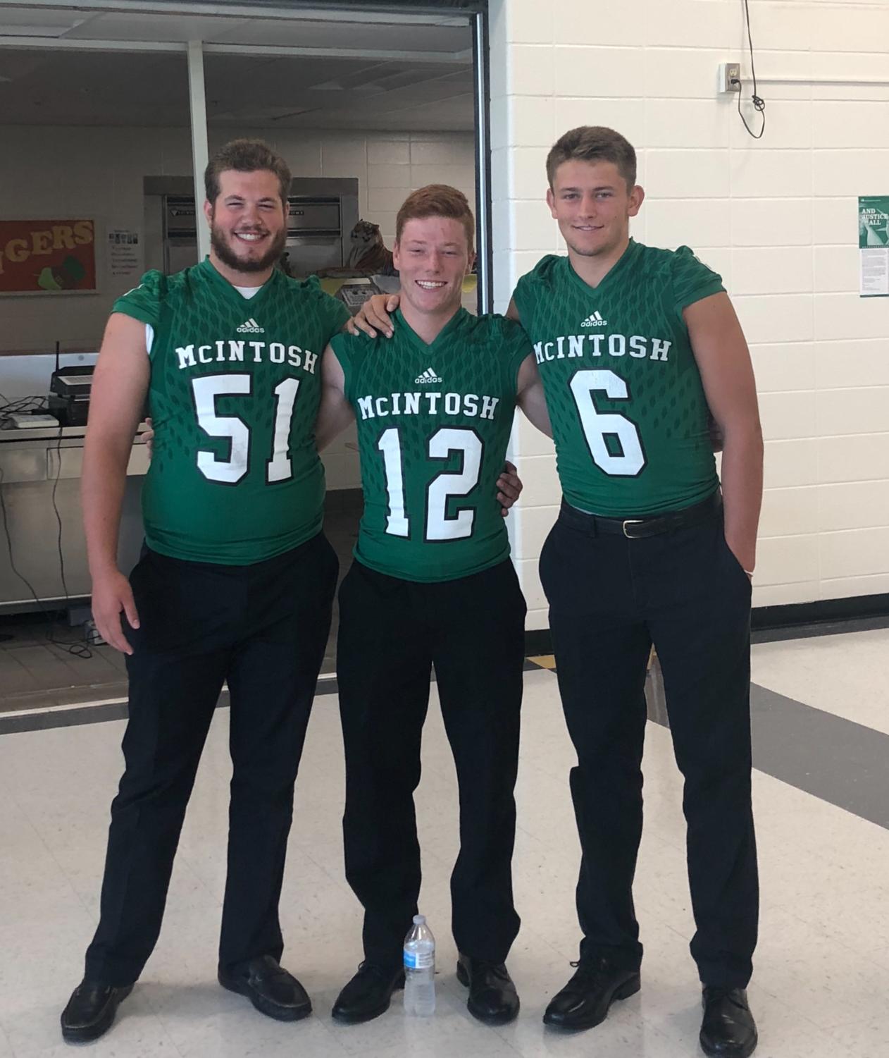 Seniors Ryan Siegel {left}, Ryan Cate {middle}, and Dane Kinamon {right} following the first media day.