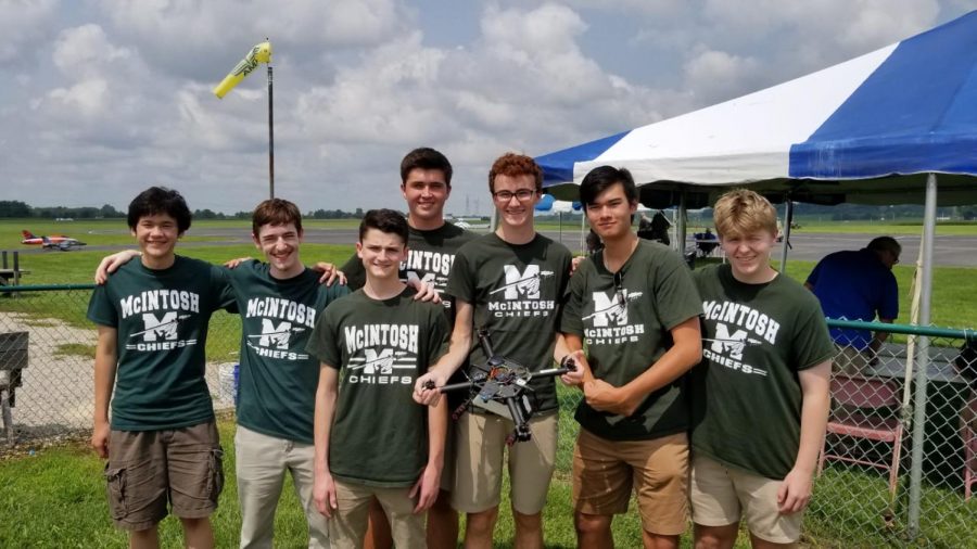 (from left-to-right: Sam Triplett, Luke Wonderley, Logan Connerat, Adrien Richez, Matthew Harmon, Robert Palla, and Noah Statton) Photo Credit: Seth Bishop
The Drone Team is lining up for a quick team photo before it is their turn to compete. They would go on to win the competition, securing the national title. 
