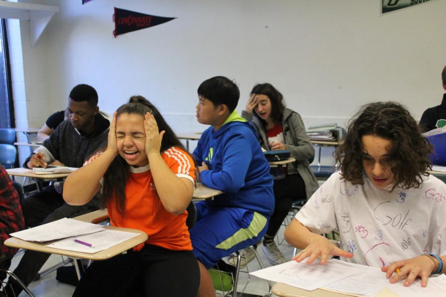 Freshman and sophomore accelerated geometry students stress over exams.