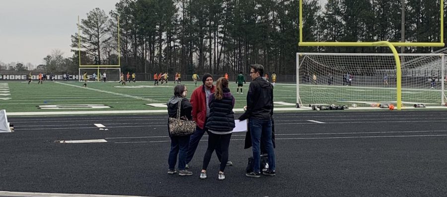 Towards the end of tryouts on Thursday, all the girls coaches circled up. They discussed how tryouts went and where they would be meeting following tryouts to discuss what team each player would be on for the upcoming season.