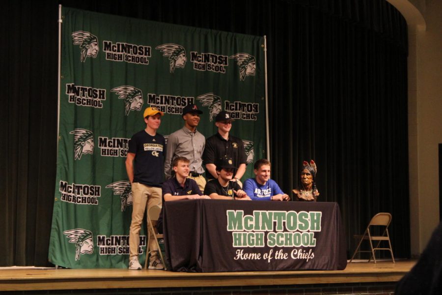 Senior signees joined together in the auditorium to officially sign in continuing their athletic and academic careers. 