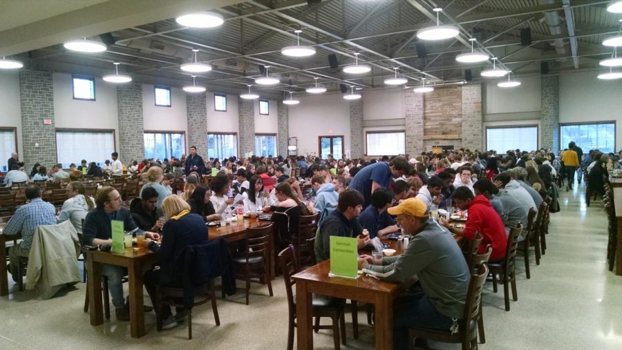 German Students from all over Georgia sit down together to eat lunch. 
