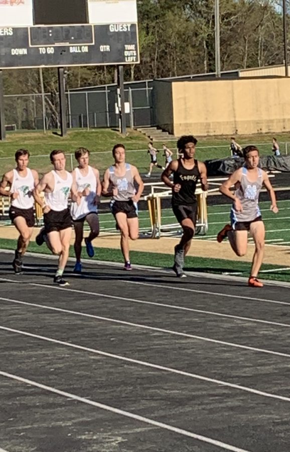 Runners participate in the 1600 at the Fayette County JV track meet.