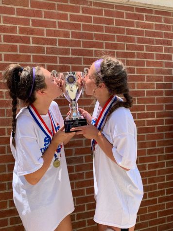 Three year varsity players, juniors Skylar Dzenis and Juliana Pickard celebrate their second state championship win. 