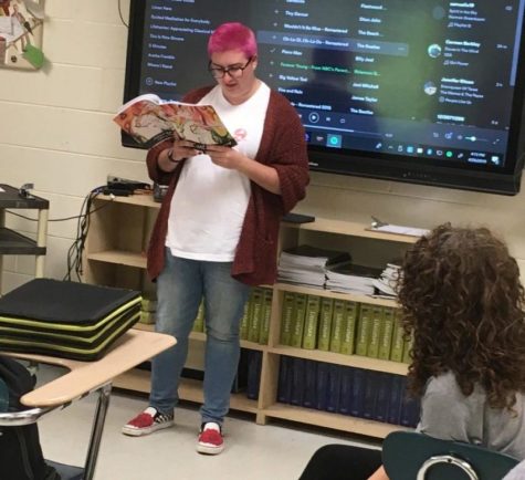 Senior Catherine Quarles read her poem, _____, to fellow MisChief members during Ms. Laklys publishing party for the magazine.