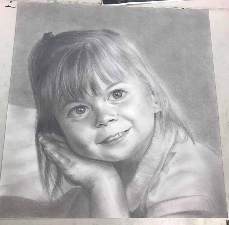 Harts childhood portrait is currently hanging in the Capitol Tunnel. Image courtesy of Jessie Hart.