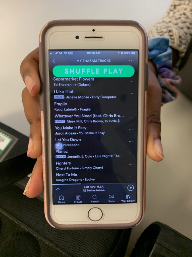 McIntosh Trail News Editor Jordyn Mobley shows the diverse range of music that she has on her Shazam tracks playlist. 