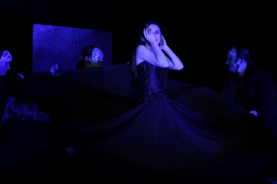 In the Competition One Act Very Still and Hard to See, Meg Sheets as Obake bathes in the ultraviolet light of her dark underworld. 
