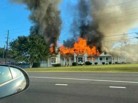 Fire destroys landmark building, home to popular market and bakery