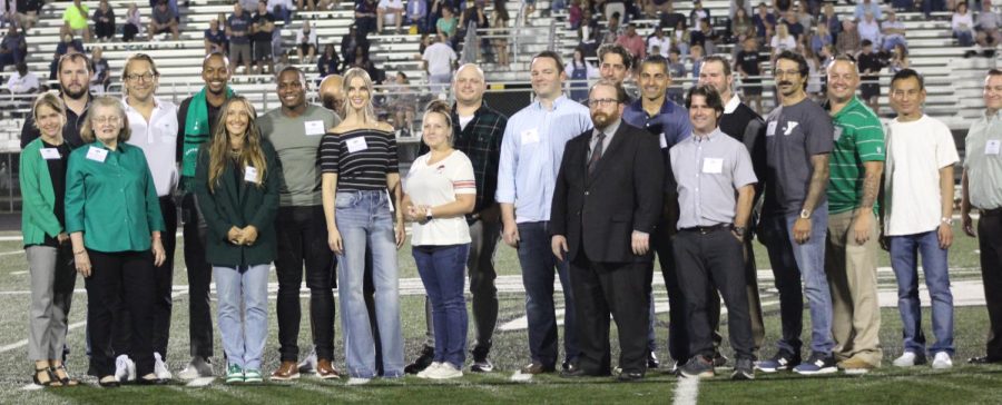 2022 Hall of Fame inductees, members of the 1997 MHS State Championship wresting team and members of the Hall of Fame. Inductees and and the 1997 wresting team were  recognized at a halftime ceremony on Sept. 16. 