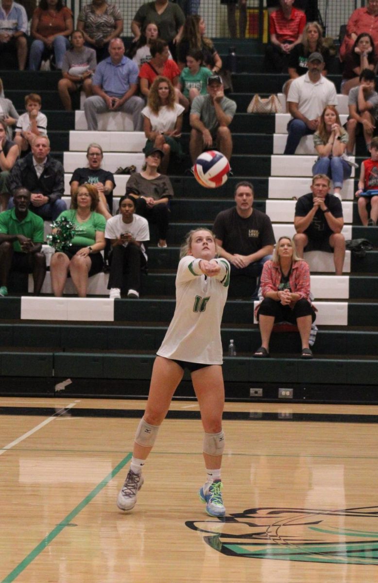Senior Libero Jaqc Fournier passes the volleyball during the 2023 volleyball season