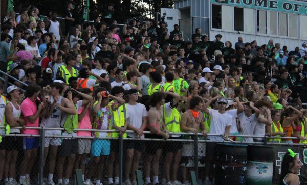 The confusion surrounding the Sept. 8 theme night led to a student section covering their bases of a mix of white and neon colors.