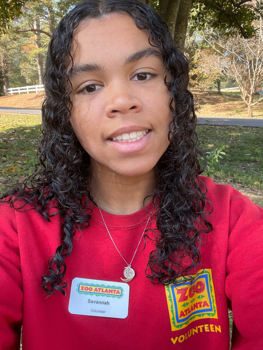 Picture of Savannah Hayes in her Zoo Atlanta Volunteen uniform.