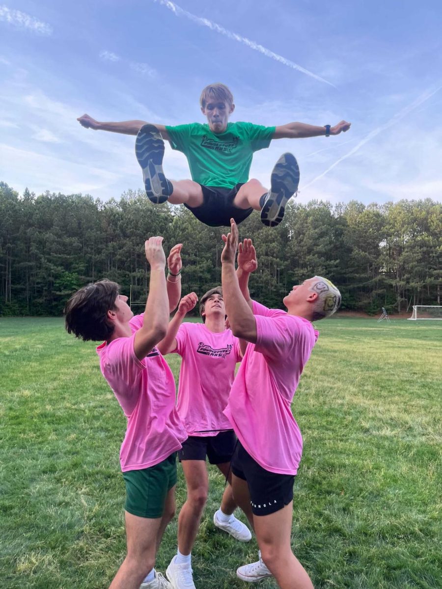 During the Powderpuff flag football game, boys and girls switch sides as the girls play flag football and the boys act as their cheerleaders. 