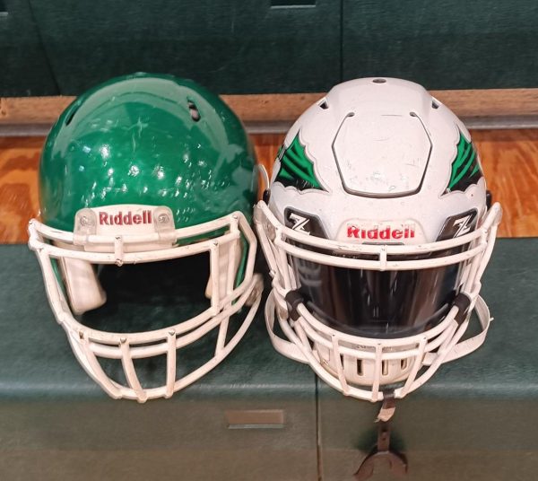 Comparison between McIntosh's old helmet (left) and the new helmet.