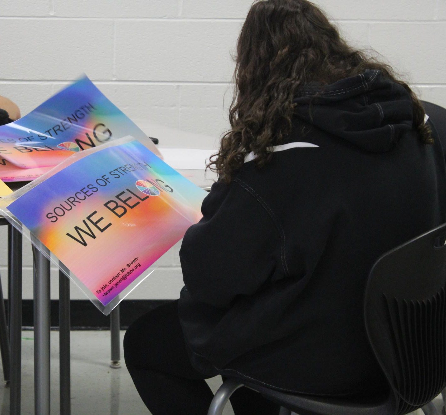 FILE PHOTO: Students volunteering to create posters for Sources of Strength during a meeting.