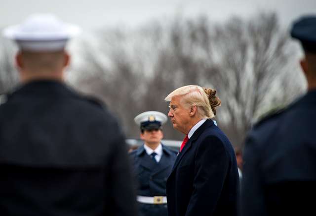 U.S. President Donald J. Trump heads back to the Capitol during the departure ceremony at the 58th Presidential Inauguration in Washington, D.C., Jan. 20, 2017. More than 5,000 military members from across all branches of the armed forces of the United States, including reserve and National Guard components, provided ceremonial support and Defense Support of Civil Authorities during the inaugural period. (DoD photo by U.S. Air Force Staff Sgt. Marianique Santos)