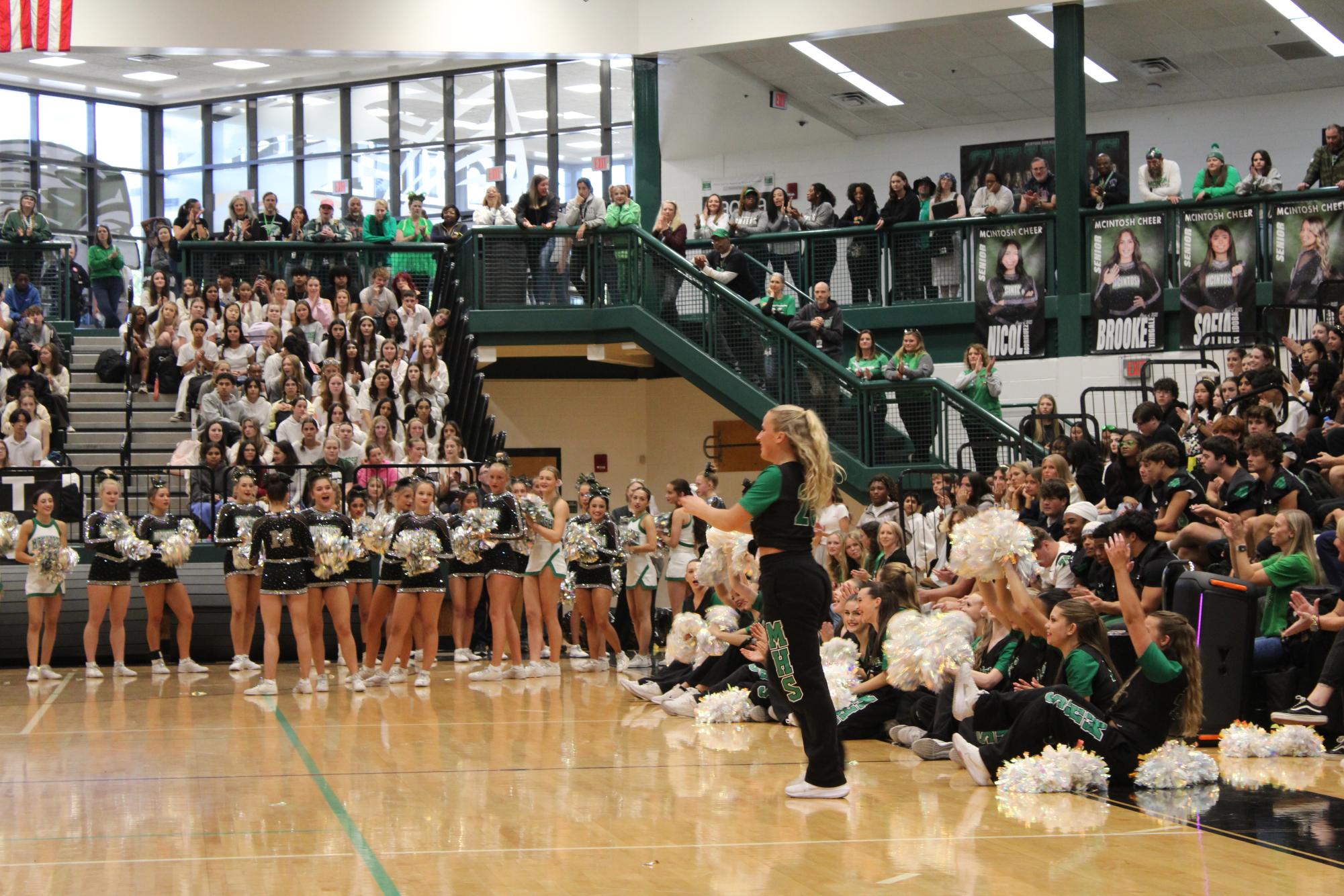 Chiefette team captains walking up to give a speech at the pep rally on Oct. 18.