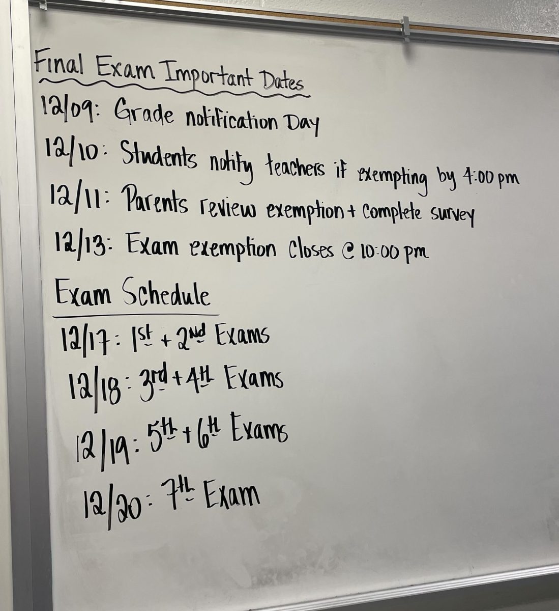 Photo of important dates for the upcoming final exam week. 
