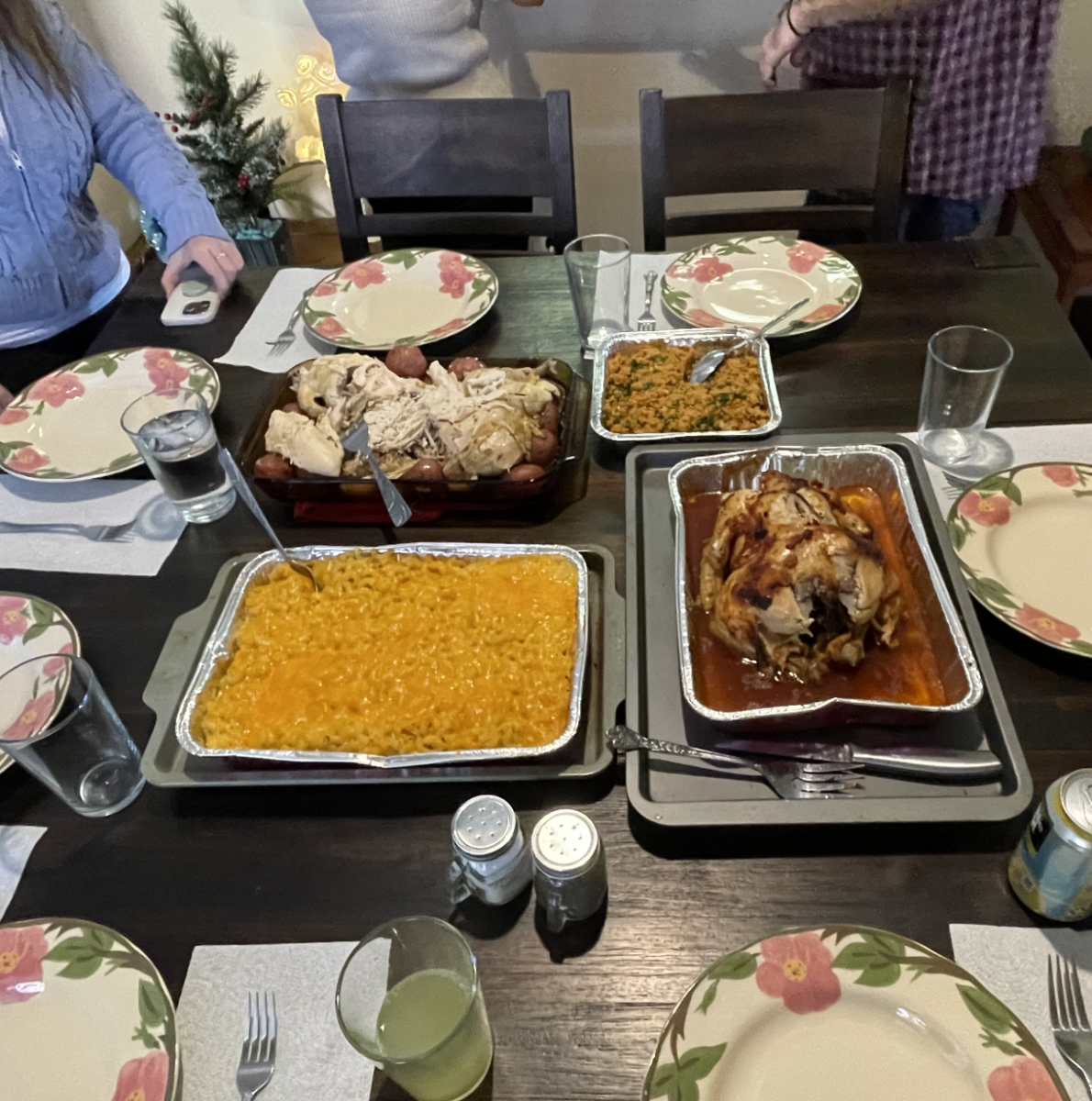 A picture of Kalpakci's thanksgiving dinner, with two types of chicken both traditional and non, Mac and cheese, and Turkish dish Kisir.