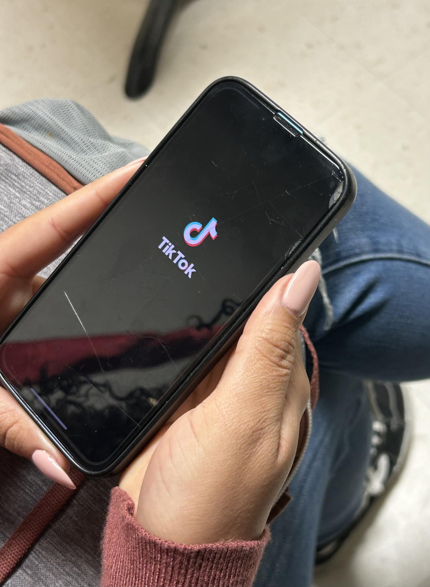 Senior Cheyenne Juacian opening TikTok during her lunch period. 