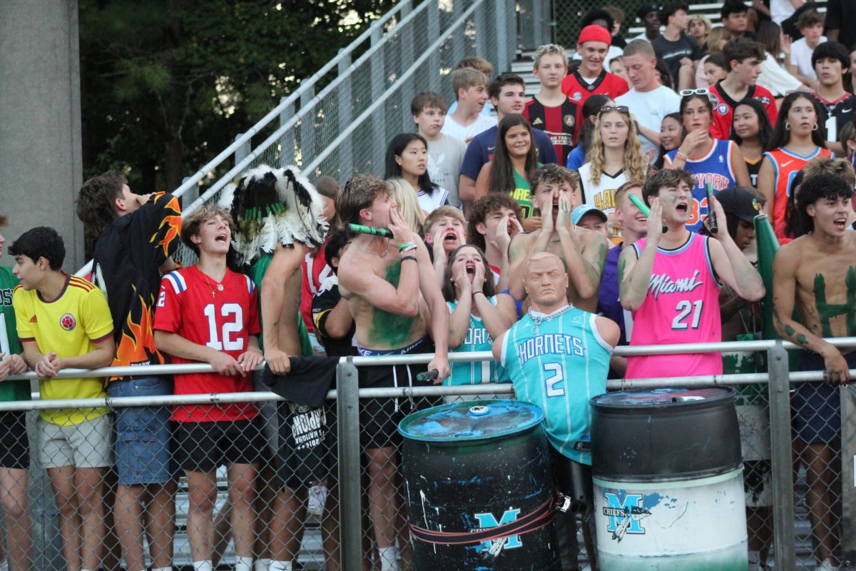 Cheering at the Football scrimmages on Aug. 9 against Whitewater.  