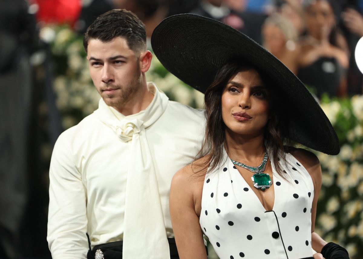 Nick Jonas and Priyanka Chopra  pose during the Met Gala, an annual fundraising gala held for the benefit of the Metropolitan Museum of Art's Costume Institute with this year's theme 'Superfine: Tailoring Black Style,' in New York City, New York, U.S., May 5, 2025. REUTERS/Mario Anzuoni
