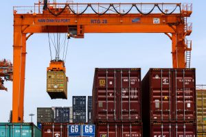 A container is loaded onto a cargo ship while docked at Hai Phong port, after U.S. President Donald Trump announced a 90-day pause on tariffs for many countries, in Hai Phong, Vietnam, April 16, 2025. REUTERS/Athit Perawongmetha