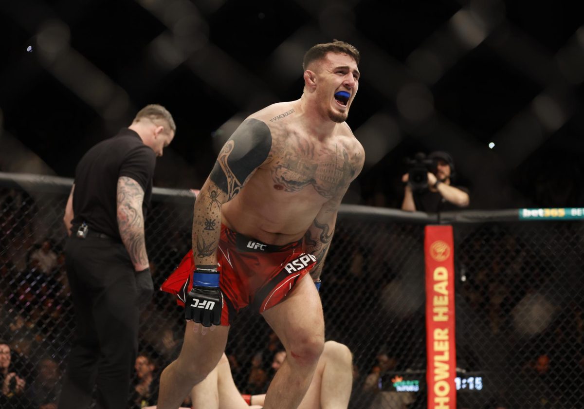 Mixed Martial Arts - UFC - Alexander Volkov v Tom Aspinall - O2 Arena, London, Britain - March 19, 2022 Tom Aspinall celebrates winning his fight against Alexander Volkov Action Images via Reuters/Peter Cziborra