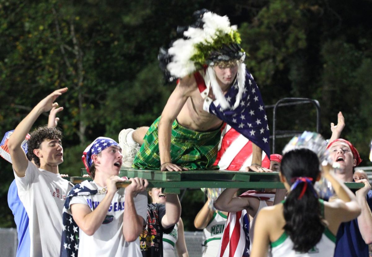 Chief Mascot, Kyle Marhefka, doing pushups for the Chief's touchdown at the Homecoming game. Photo by Dylan Cajun Lopez