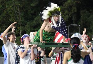 Chief Mascot, Kyle Marhefka, doing pushups for the Chief's touchdown at the Homecoming game. Photo by Dylan Cajun Lopez