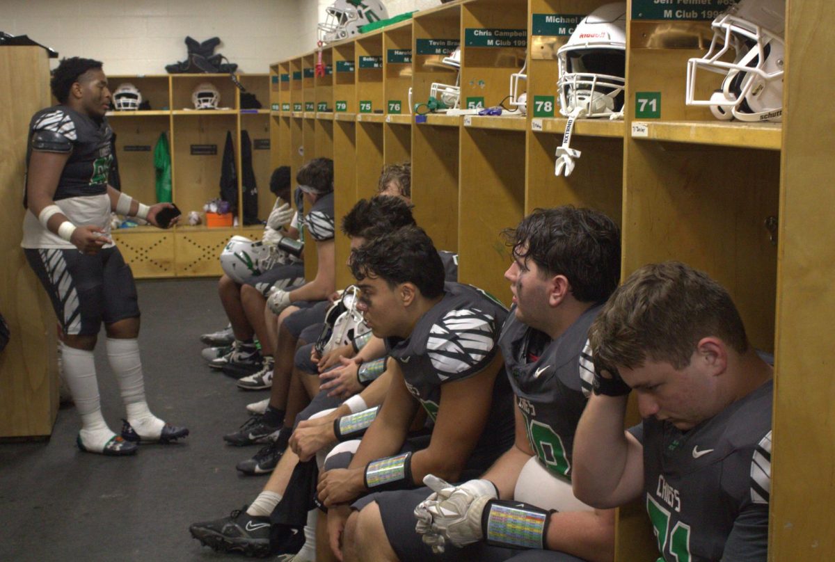 Junior DE Jayden Watson gives the Chiefs a halftime pep talk on what needs to get done in the game's second half. At halftime, the Chiefs were 0-21.