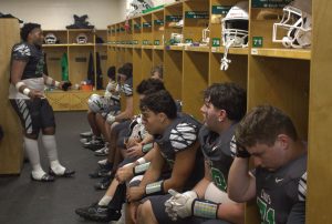 Junior DE Jayden Watson gives the Chiefs a halftime pep talk on what needs to get done in the game's second half. At halftime, the Chiefs were 0-21.