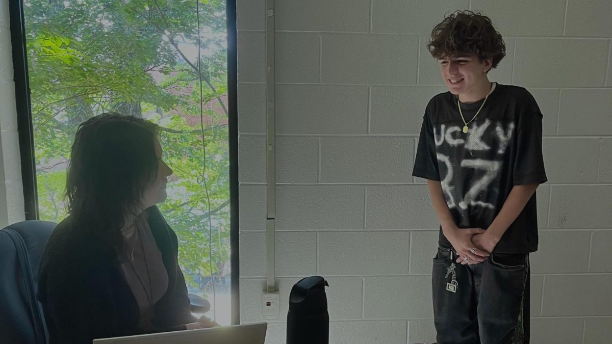 Hilary Allen advises Sophomore Dante Coiro on making good choices.