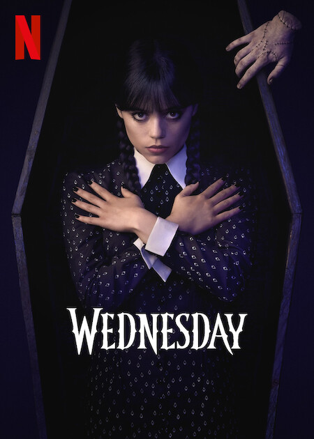 Wednesday Addams poses inside a coffin for the Netflix series "Wednesday".