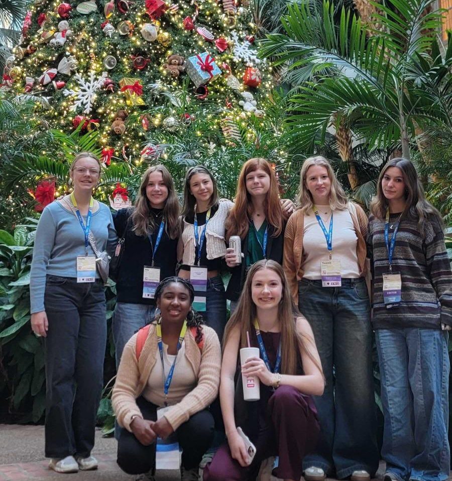 After a long convention day filled with informative journalism seminars, the Trail editors along with staffer Estella Humes pause to take a picture. Photo by Shanon Woolf