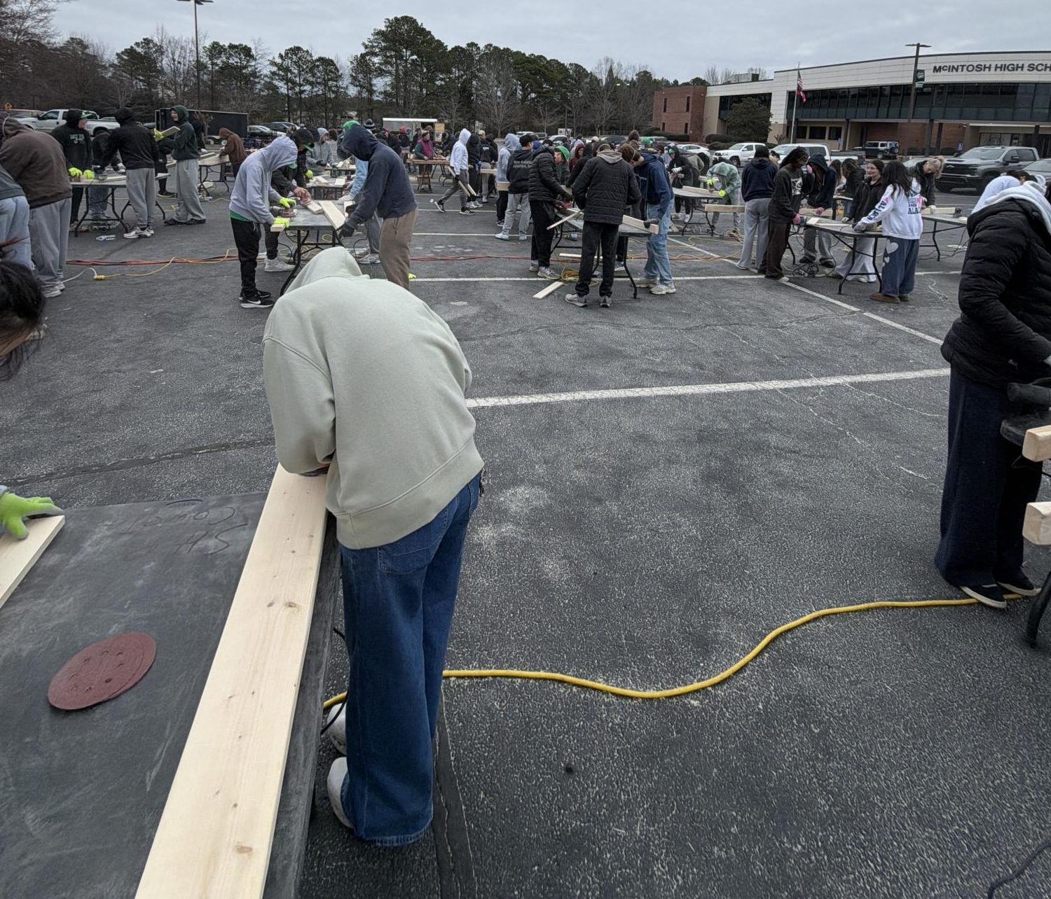 More than 100 students volunteered to build beds. Students from McIntosh and J.C. Booth Middle School signed up to help.