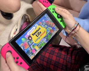 Sophomore Kris Cabo plays Tomodachi Life: Living the Dream on her Nintendo Switch